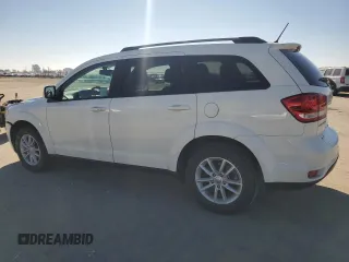 2017 Dodge Journey SXT with VIN 3C4PDCBB8HT675449, listed as a Copart auction lot 88999075 with 105,765 mi miles and Salvage Title. Bid and sale history available at DreamBid. Image 2.