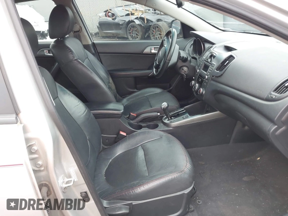 2010 Kia Forte SX with VIN KNAFW4A39A5230517, listed as a IAAI auction lot 41953297 with 154,711 mi miles. Bid and sale history available at carsss.com. Image 5.