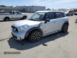 2014 MINI Countryman John Cooper Works with VIN WMWXD1C54EWS34594, listed as a Copart auction lot 55201045 with 94,899 mi miles and Salvage Title. Bid and sale history available at DreamBid. Image 1.