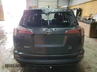2017 Toyota RAV4 LE with VIN JTMBFREVXHD219410, listed as a Copart auction lot 52990465 with 104,723 mi miles and Clean Title. Bid and sale history available at DreamBid. Image 6.