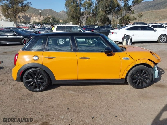 2015 MINI Cooper Hardtop 4 Door S with VIN WMWXU3C51F2B57061, listed as a IAAI auction lot 41691431 with 66,406 mi miles. Bid and sale history available at carsss.com. Image 14.