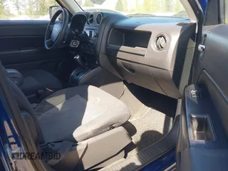 2009 Jeep Patriot Sport with VIN 1J4FT28B29D167558, listed as a IAAI auction lot 42035618 with 166,854 mi miles. Bid and sale history available at carsss.com. Image 5.