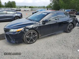 2020 Toyota Camry XSE with VIN 4T1K61AK2LU972205, listed as a Copart auction lot 55792685 with 106,696 mi miles and Salvage Title. Bid and sale history available at DreamBid. Image 1.