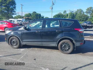 2017 Ford Escape S with VIN 1FMCU0F72HUD48601, listed as a IAAI auction lot 42511659 with 157,244 mi miles and . Bid and sale history available at DreamBid. Image 14.
