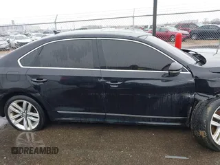 2017 Volkswagen Passat SE z VIN 1VWGT7A32HC017669, wystawiony jako IAAI lot #41938824 z przebiegiem 122 323 mil mil oraz . Historia ofert i sprzedaży dostępna na DreamBid. Obrazek 13.
