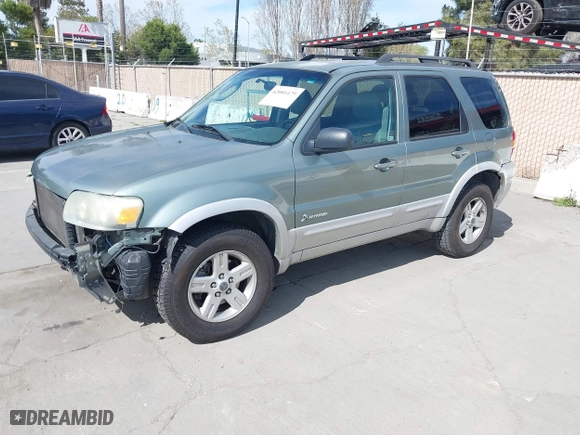 2007 Ford Escape Hybrid with VIN 1FMCU59H37KA92464, listed as a IAAI auction lot 42001479 with 159,147 mi miles. Bid and sale history available at carsss.com. Image 2.