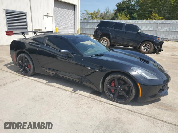 2014 Chevrolet Corvette 3LT with VIN 1G1YE2D72E5100689, listed as a Copart auction lot 50596915 with 83,073 mi miles and Salvage title. Bid and sale history available at DreamBid. Image 4.