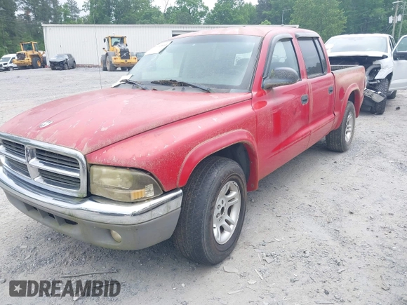 2004 Dodge Dakota SLT with VIN 1D7HL48N84S717599, listed as a IAAI auction lot 42132810 with 305,900 mi miles and . Bid and sale history available at carsss.com. Image 2.