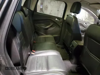 2016 Ford Escape SE z VIN 1FMCU9G98GUB07175, wystawiony jako Copart lot #44966825 z przebiegiem 118 727 mil mil oraz Szkoda całkowita • Salvage title. Historia ofert i sprzedaży dostępna na DreamBid. Obrazek 11.