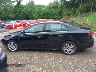 2017 Volkswagen Jetta S z VIN 3VW2B7AJ3HM303198, wystawiony jako IAAI lot #42651056 z przebiegiem 126 253 mil mil oraz . Historia ofert i sprzedaży dostępna na DreamBid. Obrazek 15.