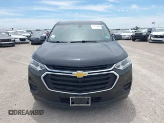 2019 Chevrolet Traverse LS z VIN 1GNERFKWXKJ301749, wystawiony jako IAAI lot #42017638 z przebiegiem 98 408 mil mil oraz . Historia ofert i sprzedaży dostępna na DreamBid. Obrazek 12.