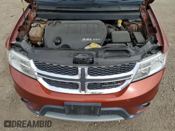 2013 Dodge Journey SXT with VIN 3C4PDCBG9DT710666, listed as a Copart auction lot 86851234 with 165,171 mi miles and Salvage title. Bid and sale history available at DreamBid. Image 14.