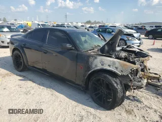 2022 Dodge Charger SRT Hellcat Widebody z VIN 2C3CDXL91NH106016, wystawiony jako Copart lot #72100084 z przebiegiem Nie podano mil oraz Nie do naprawy • Non repairable. Historia ofert i sprzedaży dostępna na DreamBid. Obrazek 4.