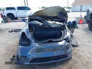2022 Tesla Model Y Long Range z VIN 7SAYGDEE8NF443194, wystawiony jako IAAI lot #42259205 z przebiegiem 38 540 mil mil oraz . Historia ofert i sprzedaży dostępna na DreamBid. Obrazek 12.