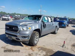 2022 Ram 1500 Lone Star with VIN 1C6RREFT3NN336321, listed as a IAAI auction lot 42190485 with 106,221 mi miles and . Bid and sale history available at DreamBid. Image 2.