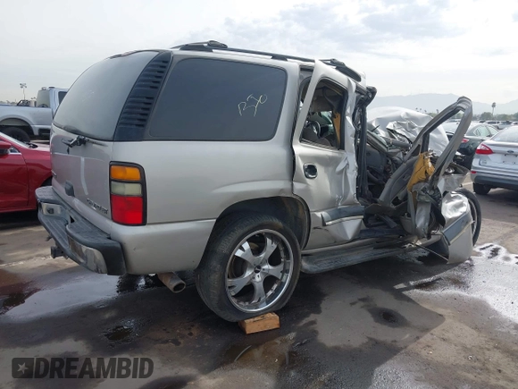 2004 Chevrolet Tahoe LT z VIN 1GNEC13ZX4R131734, wystawiony jako IAAI lot #40971315 z przebiegiem Nie podano mil oraz . Historia ofert i sprzedaży dostępna na DreamBid. Obrazek 4.