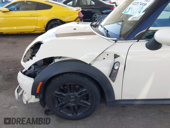2014 MINI Convertible S with VIN WMWZP3C5XET706911, listed as a IAAI auction lot 42217410 with 54,649 mi miles and . Bid and sale history available at DreamBid. Image 20.