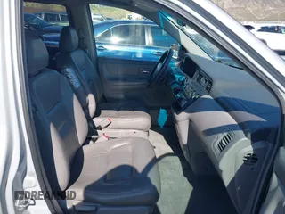 2002 Honda Odyssey EX-L z VIN 2HKRL18922H582244, wystawiony jako IAAI lot #42385121 z przebiegiem 253 186 mil mil oraz . Historia ofert i sprzedaży dostępna na DreamBid. Obrazek 5.