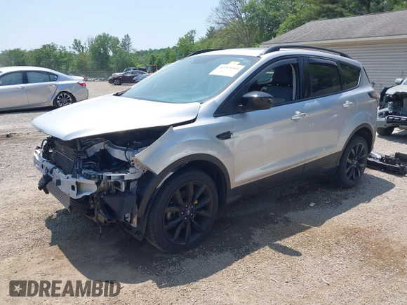 2017 Ford Escape SE z VIN 1FMCU9G95HUD37371, wystawiony jako IAAI lot #42393304 z przebiegiem 76 039 mil mil oraz . Historia ofert i sprzedaży dostępna na DreamBid. Obrazek 2.