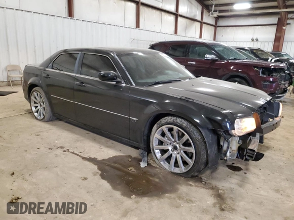 2006 Chrysler 300 C SRT8 with VIN 2C3LA73WX6H106631, listed as a Copart auction lot 50715715 with 104,990 mi miles and Clean Title. Bid and sale history available at carsss.com. Image 4.