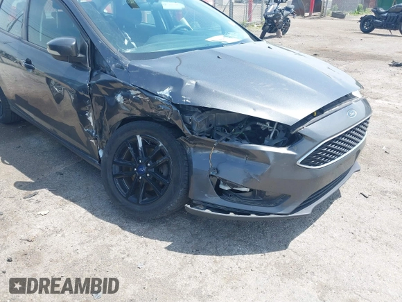 2017 Ford Focus SE with VIN 1FADP3F2XHL235013, listed as a IAAI auction lot 42370565 with 112,276 mi miles and . Bid and sale history available at DreamBid. Image 6.