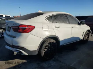 2016 BMW X6 sDrive35i with VIN 5UXKU0C56G0F92990, listed as a Copart auction lot 77191074 with 194,077 mi miles and Salvage Title. Bid and sale history available at carsss.com. Image 3.