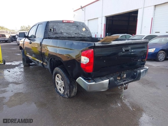 2014 Toyota Tundra 4WD Truck SR with VIN 5TFUW5F1XEX377799, listed as a IAAI auction lot 41889381 with 225,551 mi miles. Bid and sale history available at carsss.com. Image 3.