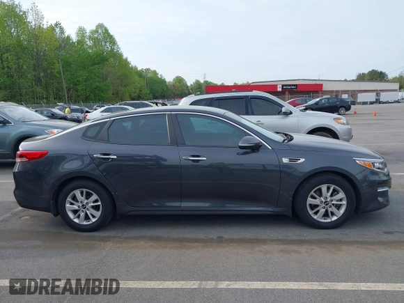 2016 Kia Optima LX with VIN KNAGT4L33G5107444, listed as a IAAI auction lot 41971006 with 174,997 mi miles. Bid and sale history available at carsss.com. Image 13.