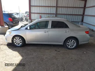 2010 Toyota Corolla with VIN 2T1BU4EE0AC269888, listed as a IAAI auction lot 41926103 with 210,787 mi miles. Bid and sale history available at carsss.com. Image 15.