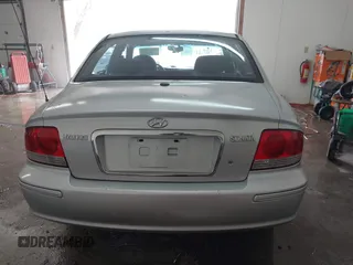 2002 Hyundai Sonata with VIN KMHWF25S42A574561, listed as a IAAI auction lot 41613838 with 141,808 mi miles. Bid and sale history available at carsss.com. Image 17.