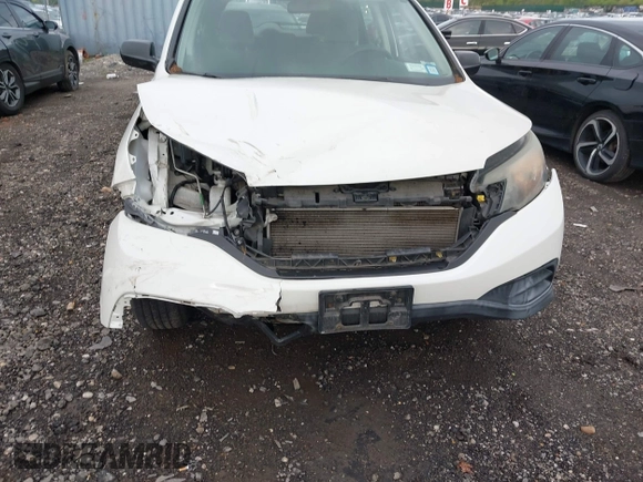 2014 Honda CR-V LX with VIN 5J6RM4H30EL088372, listed as a IAAI auction lot 42171542 with 70,418 mi miles and . Bid and sale history available at carsss.com. Image 17.