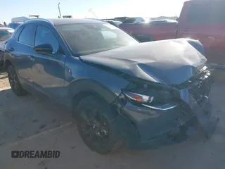 2023 Mazda CX-30 S Carbon Edition with VIN 3MVDMBCM9PM546687, listed as a IAAI auction lot 41395628 with 13,878 mi miles and . Bid and sale history available at DreamBid. Image 1.