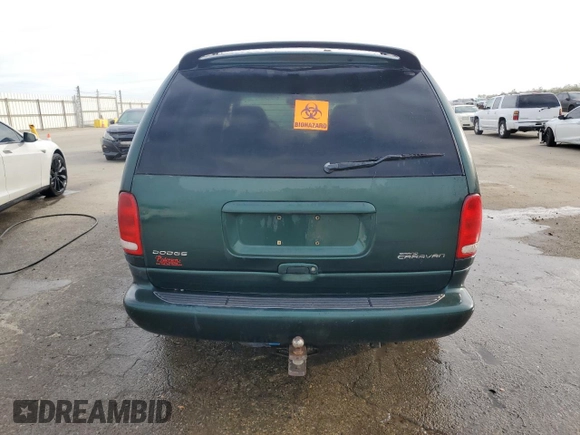 1999 Dodge Caravan SE z VIN 1B4GP44L1XB903520, wystawiony jako Copart lot #47292535 z przebiegiem 234 222 mil mil oraz Czysty tytuł • Clean title. Historia ofert i sprzedaży dostępna na DreamBid. Obrazek 6.