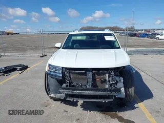 2019 Volkswagen Atlas SEL with VIN 1V2MR2CA2KC597854, listed as a IAAI auction lot 41924853 with 96,847 mi miles and . Bid and sale history available at DreamBid. Image 6.