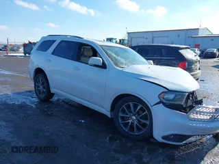 2017 Dodge Durango GT with VIN 1C4RDJDG4HC960957, listed as a IAAI auction lot 41358919 with 100,269 mi miles and . Bid and sale history available at carsss.com. Image 1.