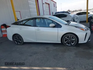2020 Toyota Prius L Eco z VIN JTDKARFU4L3116504, wystawiony jako IAAI lot #42178279 z przebiegiem 33 668 mil mil oraz . Historia ofert i sprzedaży dostępna na DreamBid. Obrazek 13.