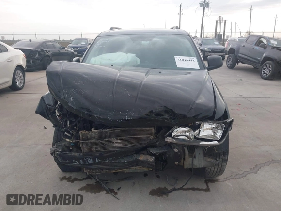 2017 Dodge Journey SE with VIN 3C4PDCAB7HT504032, listed as a IAAI auction lot 41016444 with 116,106 mi miles and . Bid and sale history available at DreamBid. Image 12.