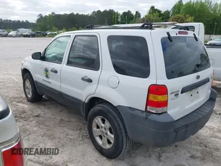 2006 Ford Escape XLT with VIN 1FMYU93196KC72975, listed as a IAAI auction lot 42088686 with 75,440 mi miles and . Bid and sale history available at DreamBid. Image 3.