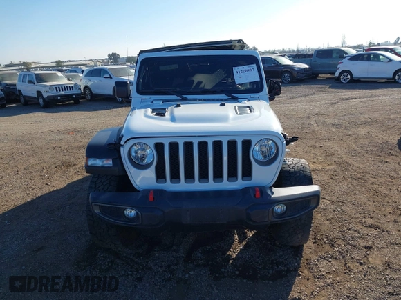 2019 Jeep Wrangler Unlimited Rubicon with VIN 1C4HJXFN7KW505383, listed as a IAAI auction lot 41220907 with 53,578 mi miles and . Bid and sale history available at DreamBid. Image 12.