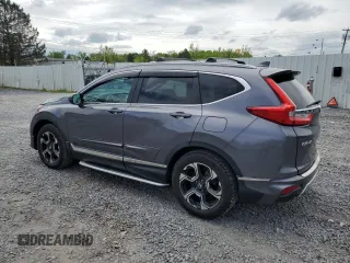 2018 Honda CR-V Touring with VIN 5J6RW2H96JL004858, listed as a Copart auction lot 56644945 with 27,642 mi miles and Salvage title. Bid and sale history available at DreamBid. Image 2.