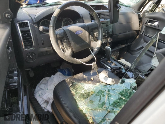 2010 Ford Escape Limited with VIN 1FMCU9EG5AKD32965, listed as a Copart auction lot 59765695 with Not provided miles and Salvage title. Bid and sale history available at DreamBid. Image 8.