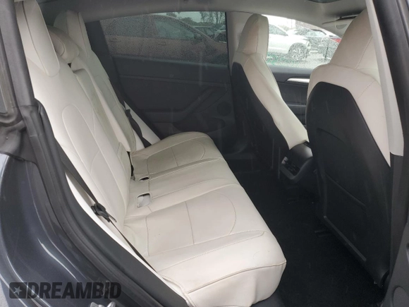 2023 Tesla Model 3 with VIN 5YJ3E1EA5PF640805, listed as a Copart auction lot 48389265 with 28,193 mi miles and Salvage title. Bid and sale history available at DreamBid. Image 10.
