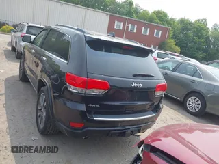 2017 Jeep Grand Cherokee Overland z VIN 1C4RJFCG4HC632929, wystawiony jako IAAI lot #42385321 z przebiegiem 205 593 mil mil oraz . Historia ofert i sprzedaży dostępna na DreamBid. Obrazek 16.