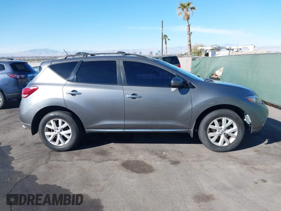 2013 Nissan Murano LE with VIN JN8AZ1MW7DW322852, listed as a IAAI auction lot 41574118 with 128,449 mi miles and . Bid and sale history available at DreamBid. Image 13.