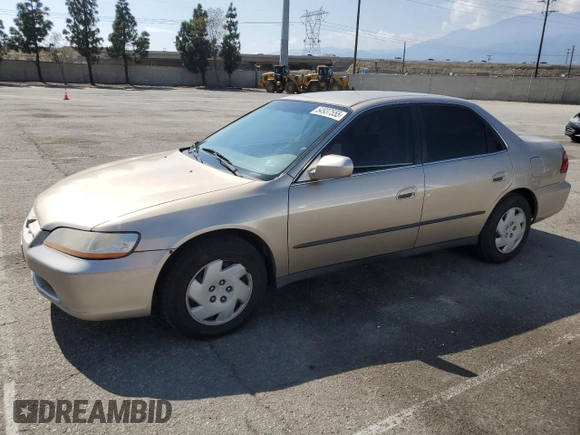 2000 Honda Accord LX z VIN 1HGCG1643YA089899, wystawiony jako Copart lot #54937555 z przebiegiem 196 596 mil mil oraz Szkoda całkowita • Salvage title. Historia ofert i sprzedaży dostępna na DreamBid. Obrazek 1.