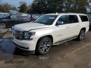 2015 Chevrolet Suburban LTZ with VIN 1GNSCKKC1FR542271, listed as a Copart auction lot 41911775 with 209,873 mi miles and Salvage Title. Bid and sale history available at DreamBid. Image 1.