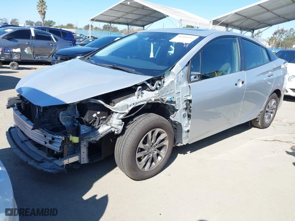 2019 Toyota Prius L Eco with VIN JTDKARFU5K3095256, listed as a IAAI auction lot 41594352 with 72,480 mi miles. Bid and sale history available at carsss.com. Image 2.