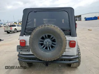 2004 Jeep Wrangler X z VIN 1J4FA39S34P702186, wystawiony jako Copart lot #59561675 z przebiegiem 202 214 mil mil oraz Szkoda całkowita • Salvage title. Historia ofert i sprzedaży dostępna na DreamBid. Obrazek 6.