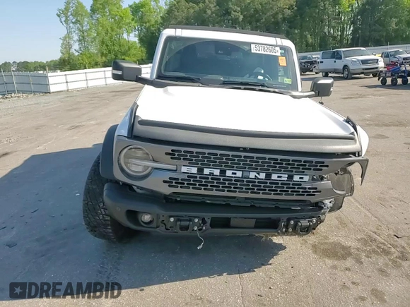 2023 Ford Bronco с VIN 1FMEE5DPXPLB63867, выставлен на аукционе Copart как лот 53782605 с пробегом 46 858 миль миль и Списание • Salvage title. История ставок и продаж доступна на DreamBid. Изображение 13.