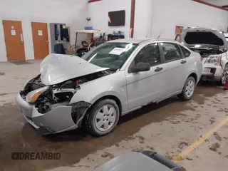 2009 Ford Focus S with VIN 1FAHP34N99W107098, listed as a IAAI auction lot 41610814 with 80,428 mi miles. Bid and sale history available at carsss.com. Image 2.